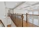 Open and airy hallway with dark metal railings that allow a view of the open space at 2353 Habersham Sw Dr, Marietta, GA 30064