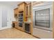 Kitchen area with stainless steel appliances, wine fridge, and custom cabinetry at 2353 Habersham Sw Dr, Marietta, GA 30064