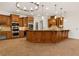 Gourmet kitchen with custom cabinetry, granite countertops, stainless steel appliances and brick flooring at 2353 Habersham Sw Dr, Marietta, GA 30064