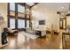 Bright and airy living room with soaring ceilings, hardwood floors, and large windows with natural light at 2353 Habersham Sw Dr, Marietta, GA 30064