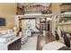 Grand living room with soaring ceilings, hardwood floors, a fireplace, and access to the upper level at 2353 Habersham Sw Dr, Marietta, GA 30064