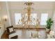 This living room features a large chandelier, bright windows, and lots of open space at 2353 Habersham Sw Dr, Marietta, GA 30064