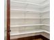 Walk-in pantry with white shelving for optimal storage at 2353 Habersham Sw Dr, Marietta, GA 30064