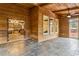 Spacious sunroom with beautiful wood paneling, tile flooring, and seamless access to outdoor deck at 2353 Habersham Sw Dr, Marietta, GA 30064