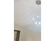 Close-up of a modern chandelier with crystal accents at 475 Mount Vernon Ne Hwy # C230, Sandy Springs, GA 30328