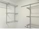 Walk-in closet showing organized storage featuring metal shelving and hanging rods at 475 Mount Vernon Ne Hwy # C230, Sandy Springs, GA 30328