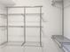 Organized closet with adjustable metal shelving units at 475 Mount Vernon Ne Hwy # C230, Sandy Springs, GA 30328