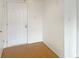 Inviting entryway featuring wood-look floors and a white front door at 475 Mount Vernon Ne Hwy # C230, Sandy Springs, GA 30328