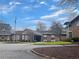 Well-maintained single-story brick building with manicured lawns and a convenient covered entrance for easy access at 475 Mount Vernon Ne Hwy # C230, Sandy Springs, GA 30328