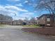 Beautifully maintained brick exterior with mature landscaping, ideal community for senior living at 475 Mount Vernon Ne Hwy # C230, Sandy Springs, GA 30328