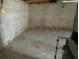 Unfinished concrete basement space ready for customization and additional living area at 533 Fayetteville Rd, Fairburn, GA 30213