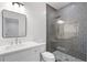 Contemporary bathroom featuring a glass enclosed shower, modern vanity and stylish fixtures at 4895 Lansbury Dr, Atlanta, GA 30342