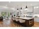Bright, eat-in kitchen boasts modern appliances, a large island with seating, and is open to the living room at 4895 Lansbury Dr, Atlanta, GA 30342