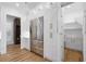 Bright eat-in kitchen with modern appliances, white cabinets, and spacious pantry at 4895 Lansbury Dr, Atlanta, GA 30342