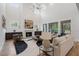 Bright living room featuring a fireplace, modern decor, and soaring ceilings at 4895 Lansbury Dr, Atlanta, GA 30342