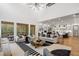 Spacious living room with modern furnishings and large windows overlooking the outdoors at 4895 Lansbury Dr, Atlanta, GA 30342