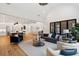 Open concept living room and kitchen with vaulted ceilings and lots of natural light at 4895 Lansbury Dr, Atlanta, GA 30342