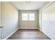 Neutral bedroom offers closet and window for natural light at 5063 White Sw Blvd, Mableton, GA 30126