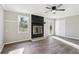 Bright living room features a fireplace and access to the outdoors at 5063 White Sw Blvd, Mableton, GA 30126