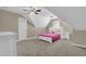 Bedroom with a sloped ceiling, carpet floors, a white bed and a door at 2020 Stockton Walk Ln, Snellville, GA 30078