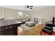 Spacious living room boasting an air hockey table and plenty of seating at 2020 Stockton Walk Ln, Snellville, GA 30078