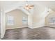 Bright bathroom featuring double sink vanity, large mirror, and shower/tub combo at 114 Highgrove Pl, Mcdonough, GA 30253