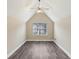 Bedroom with vaulted ceiling, ceiling fan, and wood-look flooring at 114 Highgrove Pl, Mcdonough, GA 30253