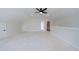 Large bonus room with access to a bathroom and closet at 160 South Village Ave, Holly Springs, GA 30115