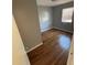 Comfortable bedroom with hardwood floors, a window for natural light, and ample space at 561 Formwalt Sw St # 8, Atlanta, GA 30312