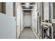 Unfinished basement featuring exposed framework, pipes, and electrical outlets, offering potential for storage at 6120 Gwendoline Dr, Atlanta, GA 30349