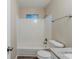 Bright bathroom featuring a tiled shower-tub combination and a light-toned vanity countertop at 6120 Gwendoline Dr, Atlanta, GA 30349