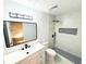 Modern bathroom features a sleek vanity, and a walk-in shower with mosaic tile accents at 782 Fox Valley Dr, Stone Mountain, GA 30088