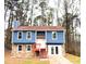 Charming two-story home boasts a combination stone and siding exterior and inviting entry steps at 782 Fox Valley Dr, Stone Mountain, GA 30088