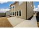 Spacious backyard featuring a concrete patio with an outdoor area perfect for entertaining and relaxation at 411 Ridgeway Ln, Canton, GA 30114