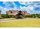 Exterior of the beautiful community clubhouse featuring manicured lawns and an inviting entrance at 411 Ridgeway Ln, Canton, GA 30114