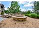 Stone fire pit seating area, perfect for outdoor gatherings and cozy evenings at 411 Ridgeway Ln, Canton, GA 30114