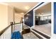 Second floor landing with carpet runner and view of Gathering room at 411 Ridgeway Ln, Canton, GA 30114