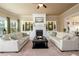 Living room featuring a fireplace, built-in shelving, and comfortable seating at 411 Ridgeway Ln, Canton, GA 30114
