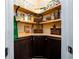 Walk in pantry with custom wood shelves and storage at 411 Ridgeway Ln, Canton, GA 30114