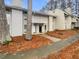Charming townhouse featuring a classic design, neat landscaping, and a welcoming entrance at 4409 Idlewood Ln, Tucker, GA 30084