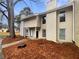 Two-story exterior elevation with neutral siding and large windows at 4409 Idlewood Ln, Tucker, GA 30084