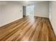 A spacious main bedroom with neutral walls, light wood flooring, and ensuite bathroom at 4409 Idlewood Ln, Tucker, GA 30084