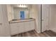 Bathroom featuring a double sink vanity with granite countertops at 15 Barton Lane, Covington, GA 30016