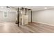 Spacious basement featuring gray vinyl flooring, water heater, HVAC, and painted block walls at 4055 Covey Ln, Douglasville, GA 30135