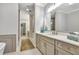 Elegant bathroom featuring double sinks, bright light and ample counter space at 578 Brashy Street, Woodstock, GA 30188