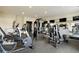 On-site gym with modern equipment and mirrors for a convenient fitness experience at 578 Brashy Street, Woodstock, GA 30188