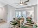 Bright living room featuring stylish seating, neutral decor, and access to outdoor balcony at 578 Brashy Street, Woodstock, GA 30188