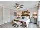Warm bedroom featuring carpet, paneled wall, and complementary decor at 578 Brashy Street, Woodstock, GA 30188