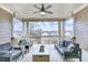 Inviting covered patio featuring stylish furniture and a cozy fire pit, perfect for outdoor relaxation at 578 Brashy Street, Woodstock, GA 30188