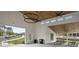 Outdoor community space with long picnic tables and bright exterior, perfect for entertaining at 578 Brashy Street, Woodstock, GA 30188